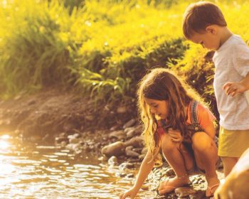 kids playing in nassau county boggy creek river