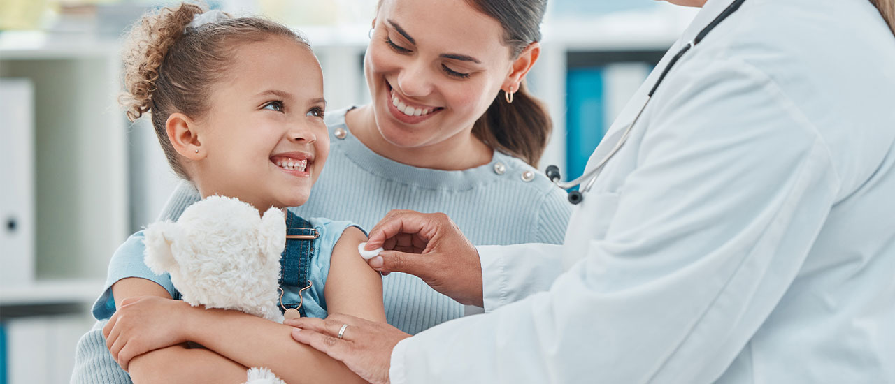 child and mom with doctor