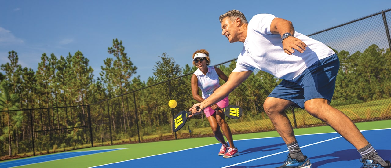 tributary playing pickleball at community in North Florida