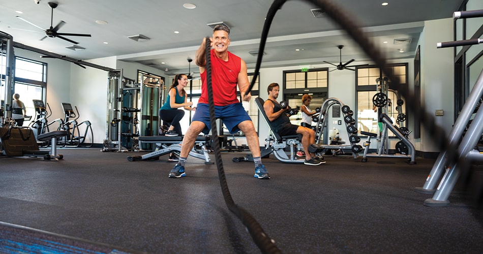 tributary resident working in fitness center at community in North Florida 